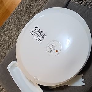 Lean mean fat grilling machine